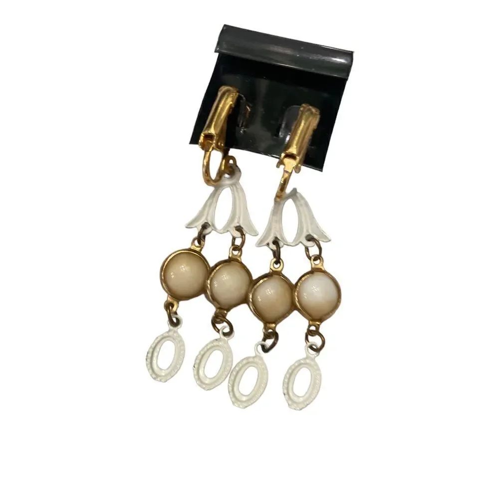 New Vintage 1990’s soft clip on drop earrings gold tone swirl & white enamel